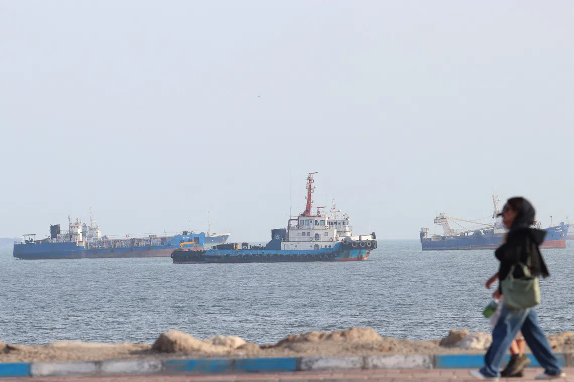 Vessels in the Strait of Hormuz near the beach of Bandar Abbas, Iran, Oct 13, 2026.