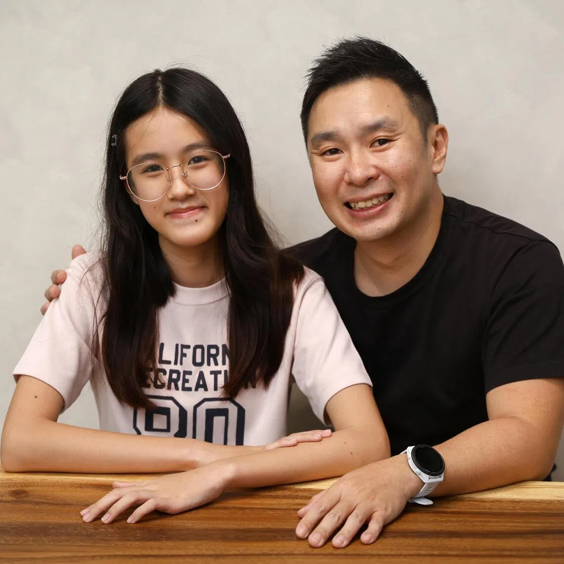 Faith, a Secondary 1 student at Paya Lebar Methodist Girls’ School, and her father Desmond Goh. She sat the PSLE in 2025.