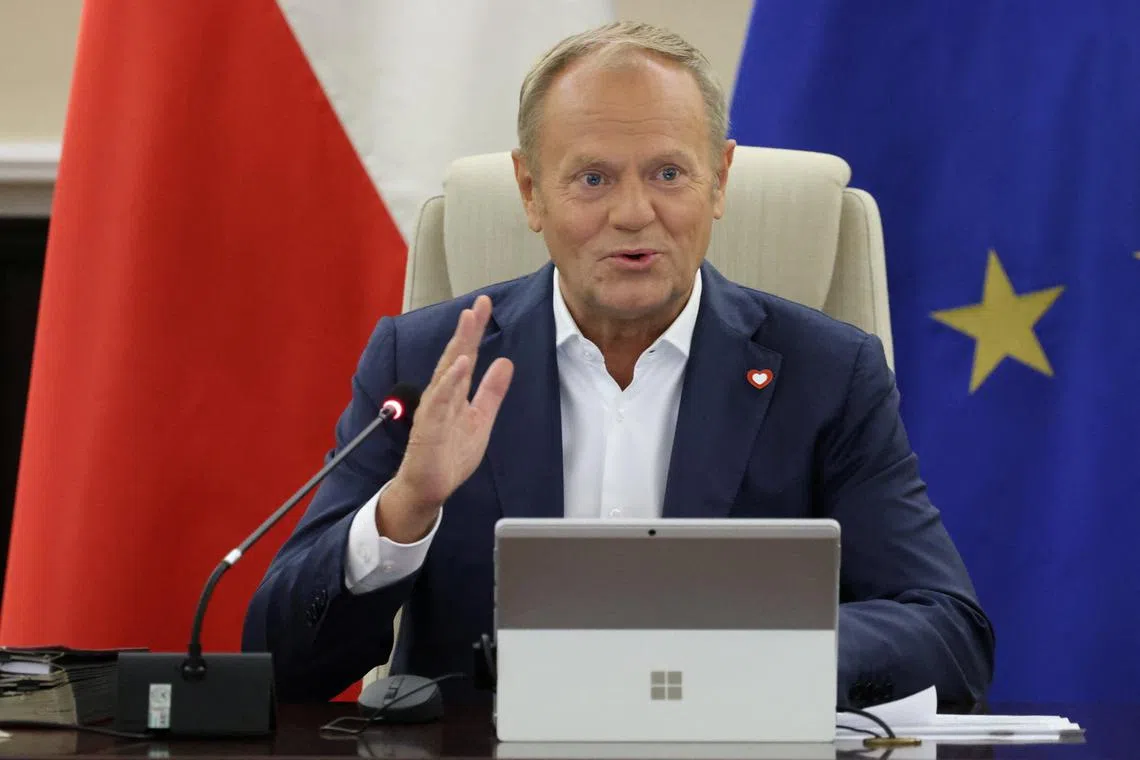 Polish Prime Minister Donald Tusk speaks during government sitting in Warsaw, Poland, August 12, 2025. Robert Kowalewski/Agencja Wyborcza.pl via REUTERS