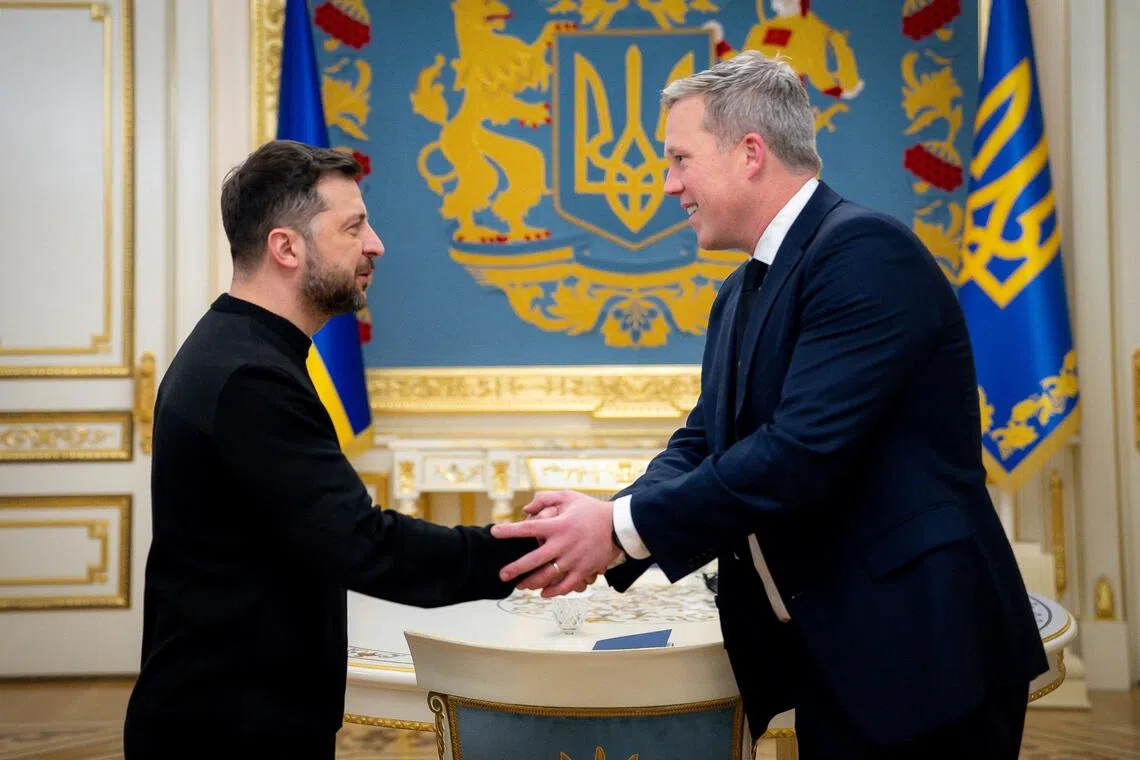 Ukrainian President Volodymyr Zelensky (left) welcoming US Army Secretary Dan Driscoll to Kyiv on Nov 20.