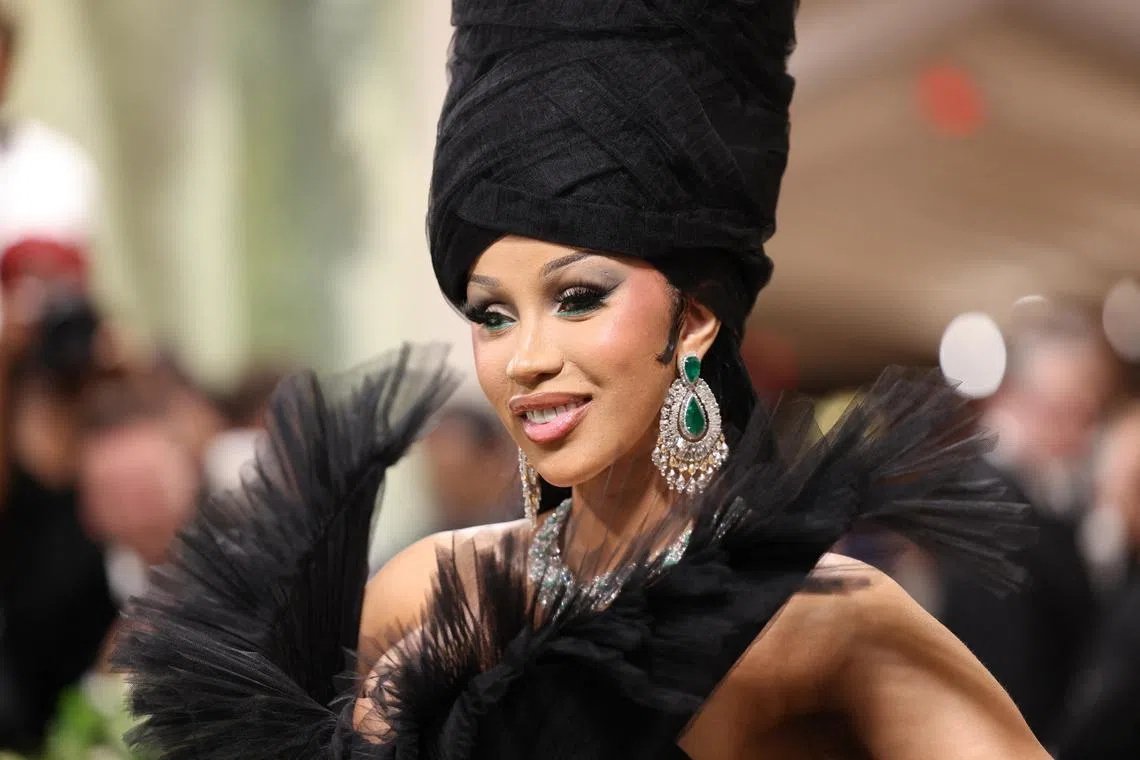 Cardi B poses at the Met Gala, an annual fundraising gala held for the benefit of the Metropolitan Museum of Art's Costume Institute with this year's theme Sleeping Beauties: Reawakening Fashion in New York  on May 6, 2024. 