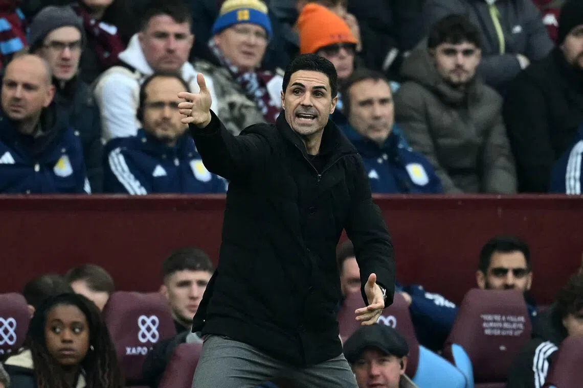 Arsenal manager Mikel Arteta shouts instructions to his players from the touchline during the Premier League match against Aston Villa.