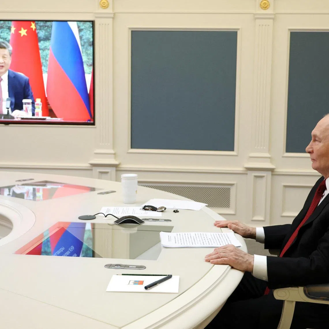 Russia's President Vladimir Putin holds talks with China's President Xi Jinping via video link from Moscow, Russia, February 4, 2026. Sputnik/Vyacheslav Prokofyev/Pool via REUTERS