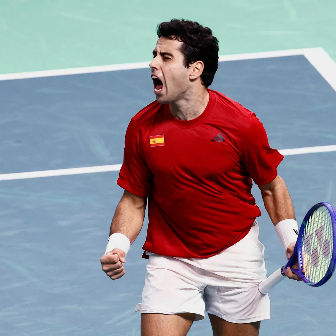 Tennis - Davis Cup - Final 8 - Spain v Czech Republic - SuperTennis Arena, Bologna, Italy - November 20, 2025 Spain's Jaume Munar celebrates after winning his match against Czech Republic's Jiri Lehecka REUTERS/Alessandro Garofalo