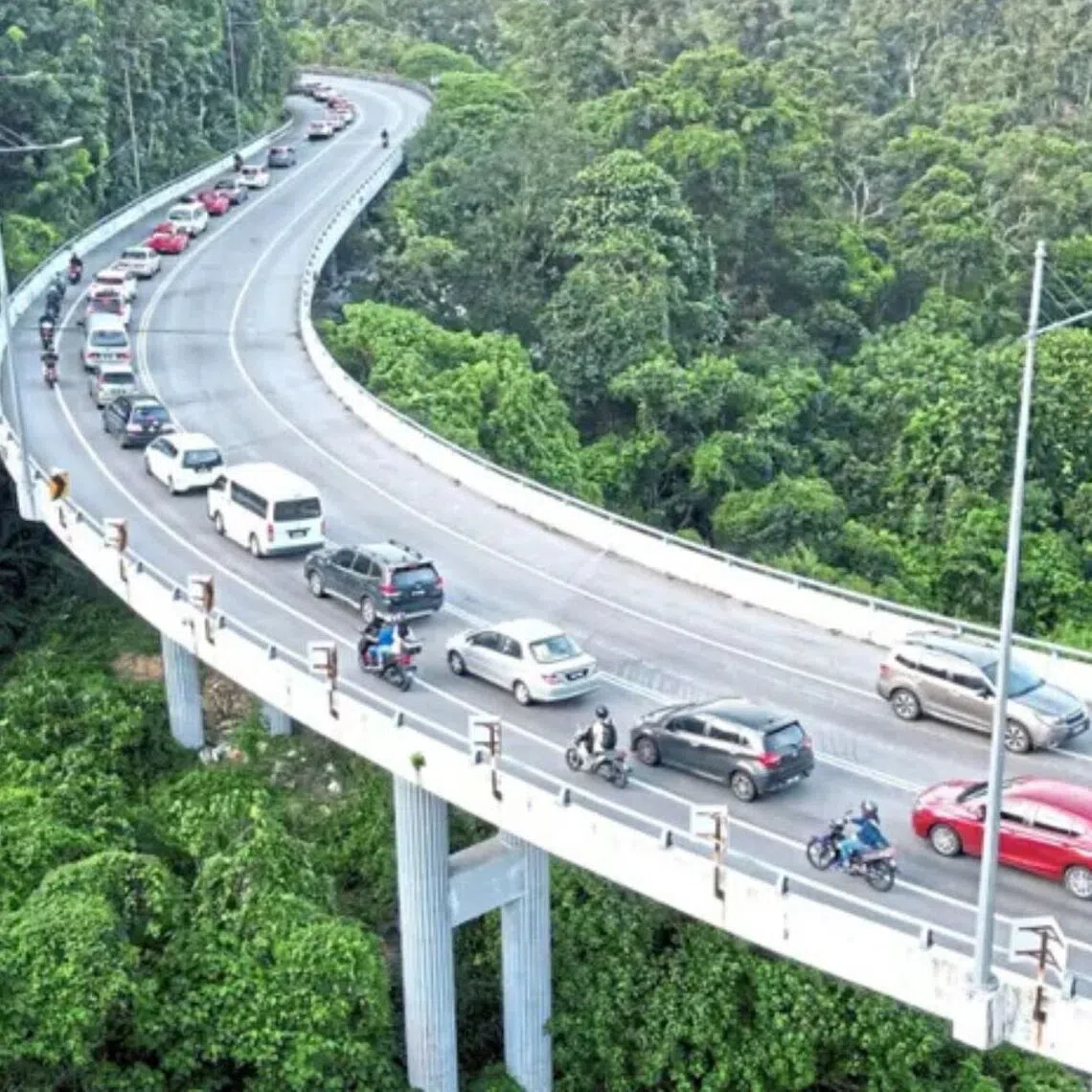 The morning rush has slowed to a crawl as all vehicles are funnelled through Jalan Teluk Kumbar, the only remaining road between Balik Pulau and Bayan Lepas.