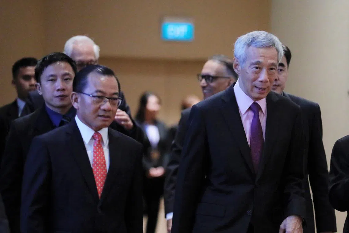 Mr Seah Kian Peng (left) with PM Lee Hsien Loong at the FairPrice Group's 50th anniversary gala dinner on July 22, 2023.