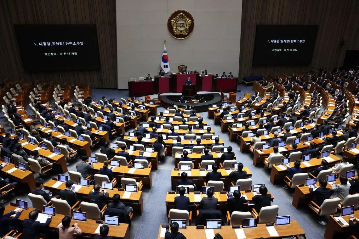 Lawmakers attend a plenary session ahead of a vote on a second impeachment motion against President Yoon at the National Assembly in Seoul on Dec 14.