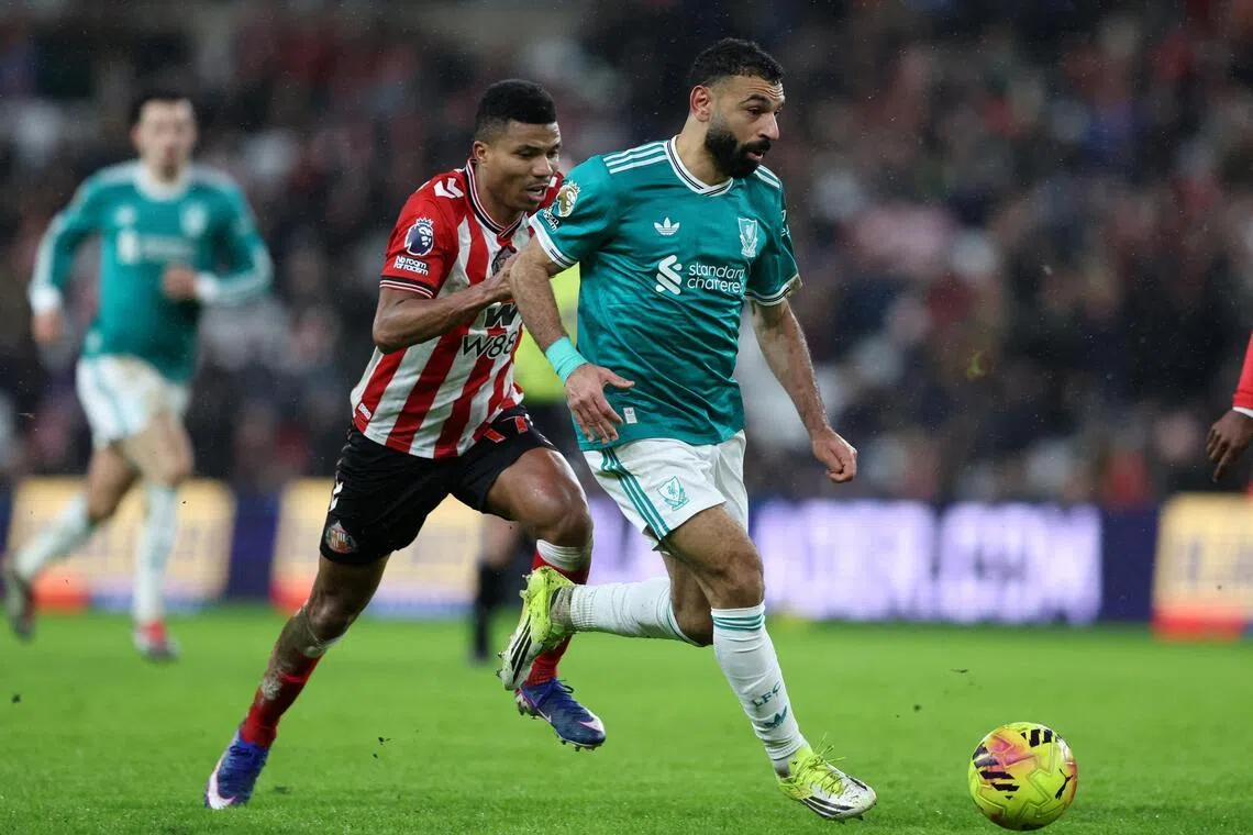 Liverpool's Mohamed Salah in action with Sunderland's Reinildo Mandava during the Reds' 1-0 win on Feb 11.