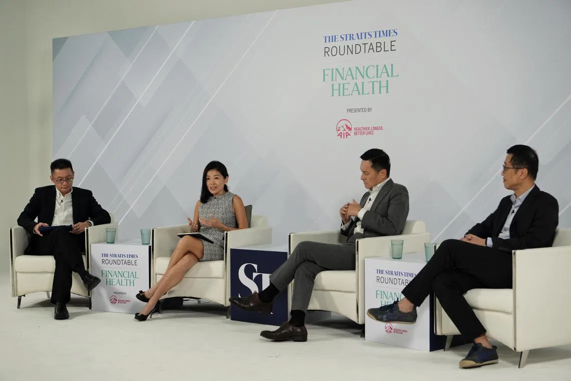 (From left) Moderator Tan Ooi Boon with panellists Melita Teo from AIA Singapore, SGH's Tan Hiang Khoon and biotech professional Herbert Ho at the ST Roundtable on Financial Health.