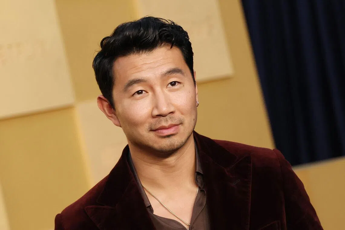 Canadian actor Simu Liu attends the premiere of Netflix's "In Your Dreams" at the Egyptian Theatre in Los Angeles, California on October 28, 2025. (Photo by Michael Tran / AFP)