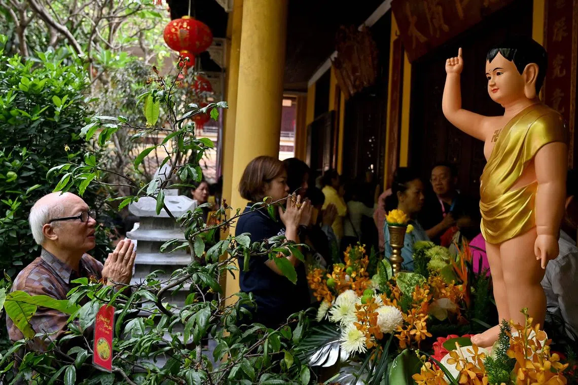 A man prays at the Quan Su Pagoda in Hanoi on May 12, 2025, as Buddhists celebrated Vesak Day.