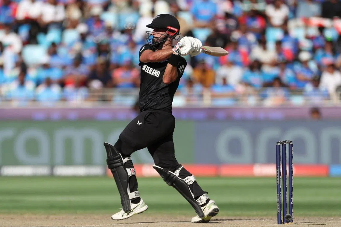 Cricket - ICC Men's Champions Trophy - Final - India v New Zealand - Dubai International Stadium, Dubai, United Arab Emirates - March 9, 2025 New Zealand's Daryl Mitchell in action REUTERS/Satish Kumar
