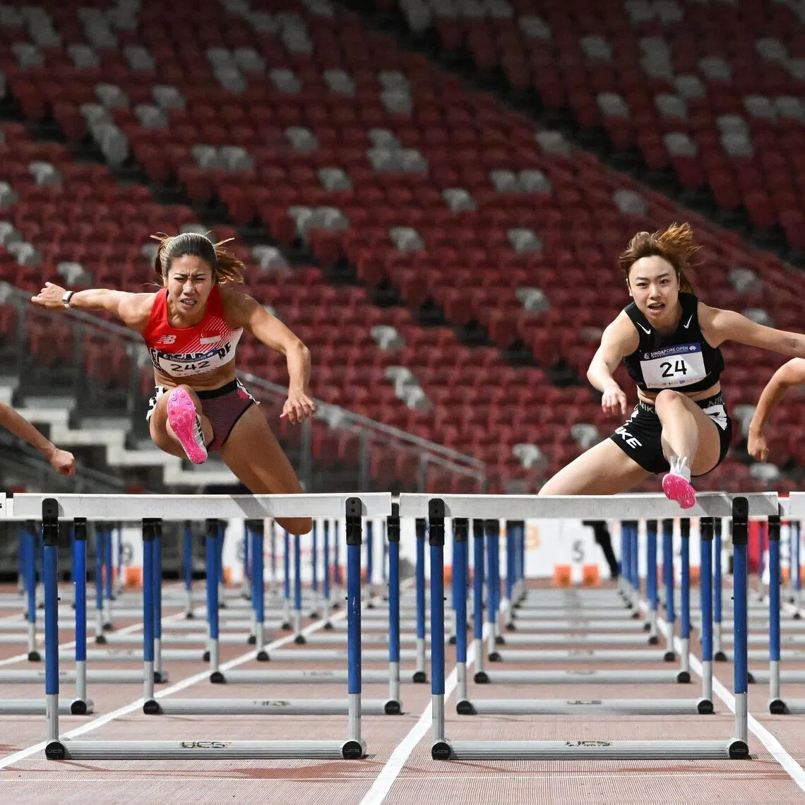 (From left) Hong Kong's Ivy Liu, Singapore's Kerstin Ong, Hong Kong's Lau Tsz Yan and Jelly Dianne Paragile of the Philippines competing in the women's 100m hurdles final at the Singapore Open Track and Field Championships on April 15.