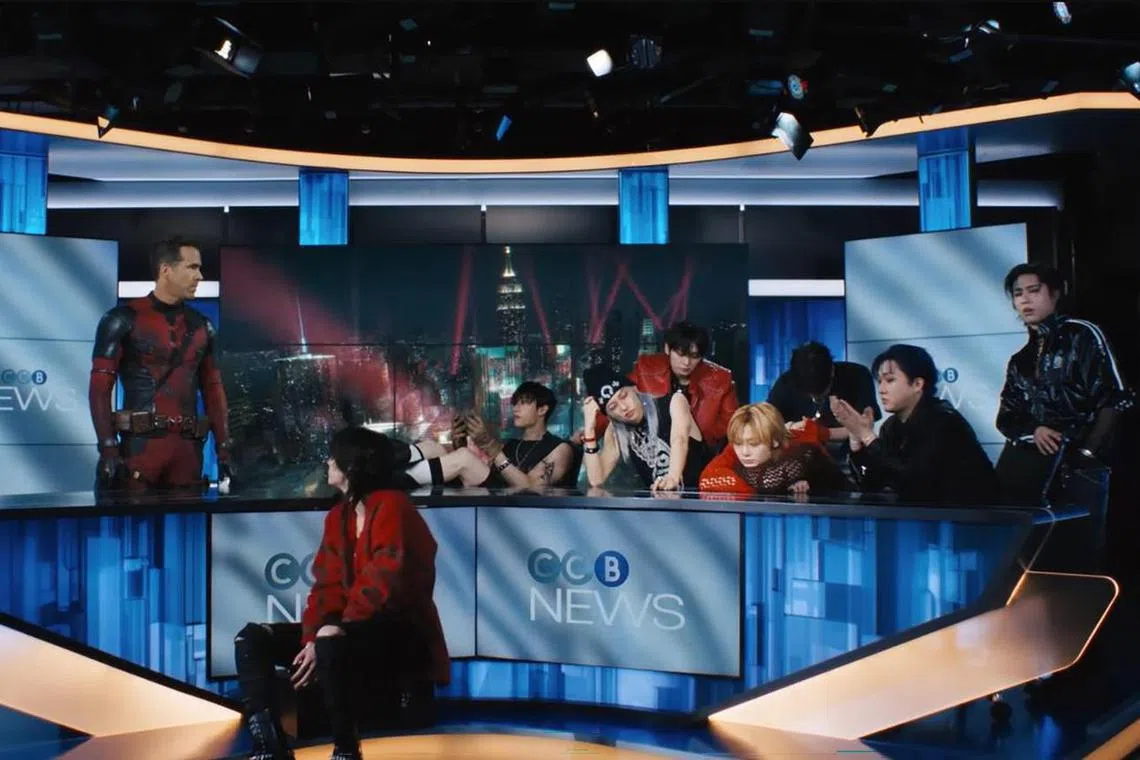 Deadpool & Wolverine star Ryan Reynolds (far left) with members of K-pop boy band Stray Kids, as he makes a cameo in their Chk Chk Boom music video.