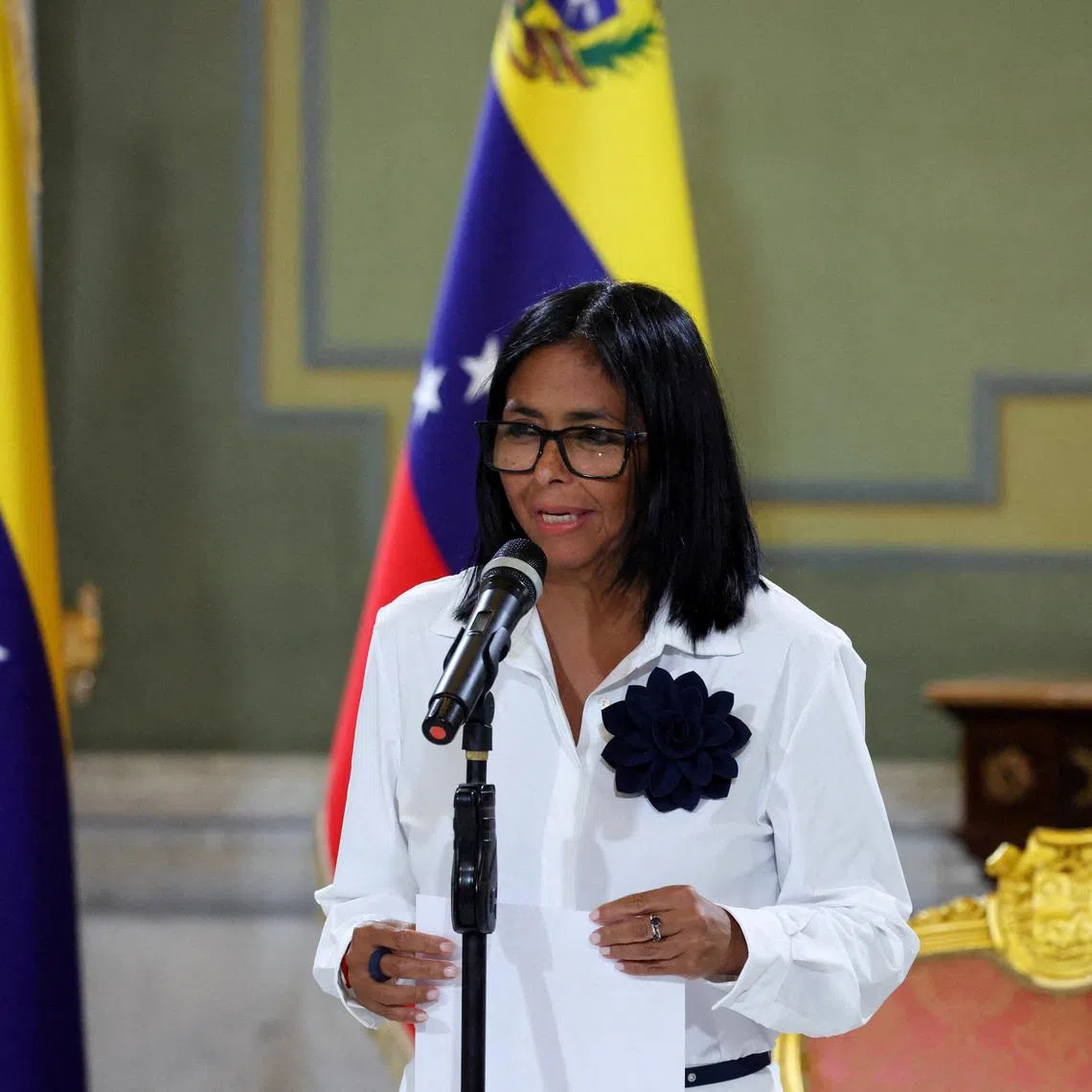 FILE PHOTO: Venezuela's interim President Delcy Rodriguez addresses the media, in Caracas, Venezuela April 13, 2026. REUTERS/Leonardo Fernandez Viloria/File Photo