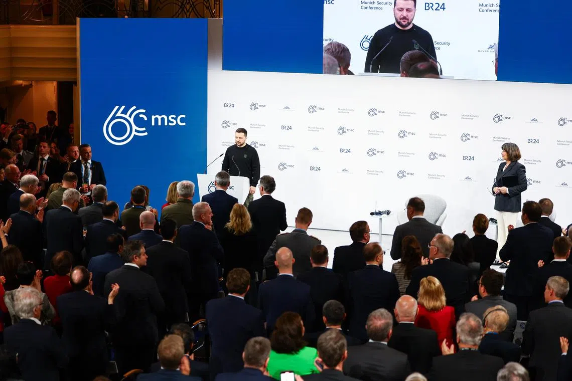 Ukrainian President Volodymyr Zelensky receives standing ovation prior to delivering his speech at the Munich Security Conference, in Germany.