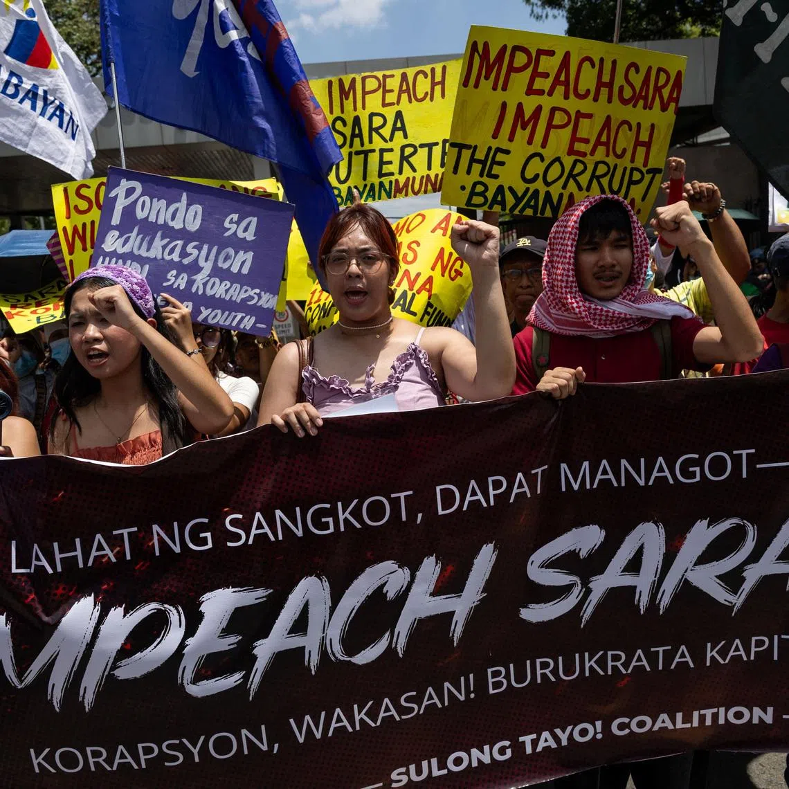 Protesters call for the impeachment of Philippine Vice President Sara Duterte ahead of a vote in the House of Representatives on whether to transmit the impeachment complaint to the Senate, outside the House of Representatives in Quezon City, Philippines, May 11, 2026. REUTERS/Eloisa Lopez