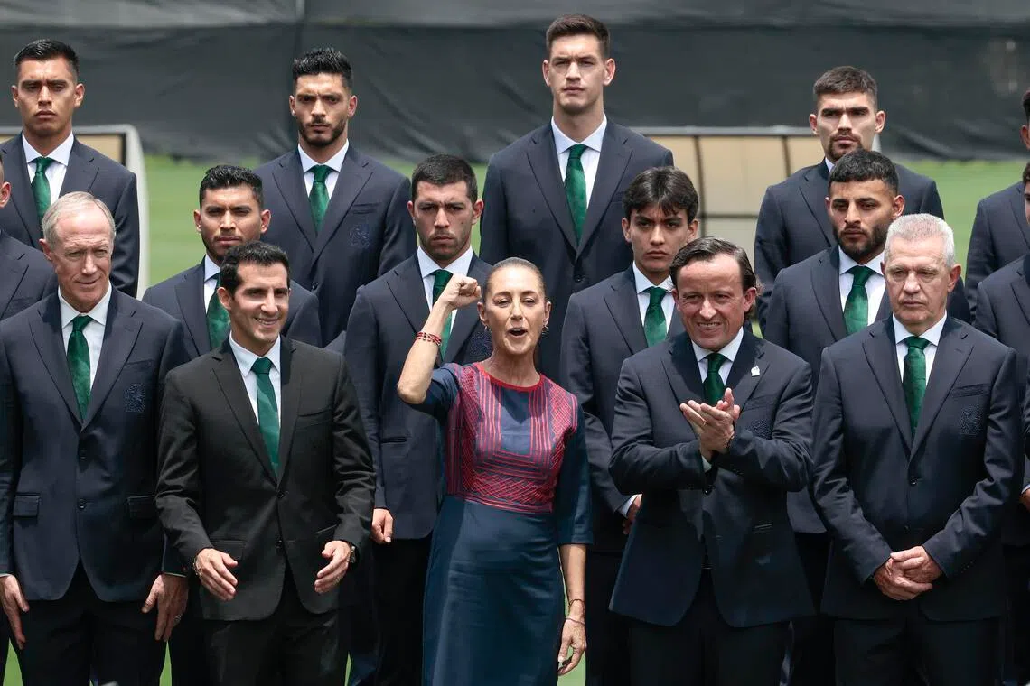 (From left) Mexican Football Federation president Ivar Sisniega, National Commission for Physical Culture and Sports director Rommel Pacheco, Mexico President Claudia Sheinbaum, Liga MX president Mikel Arriola, and Mexican national soccer team coach Javier Aguirre during a flag-presentation ceremony for the team in Mexico City on June 8. 