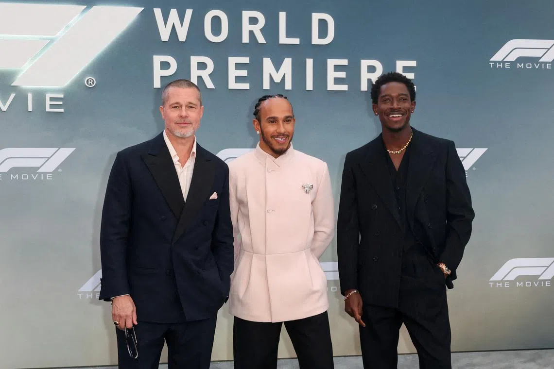 FILE PHOTO: Brad Pitt, Lewis Hamilton and Damson Idris attend the premiere for the film \"F1 The Movie\" in New York City, U.S., June 16, 2025. REUTERS/Kylie Cooper/File Photo