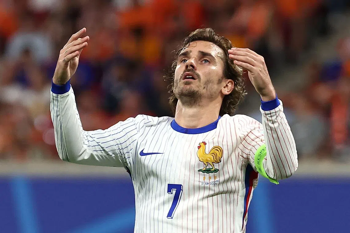 France midfielder Antoine Griezmann reacting after missing a chance during the 0-0 Euro 2024 Group D football match between the Netherlands and France in Leipzig on June 21.