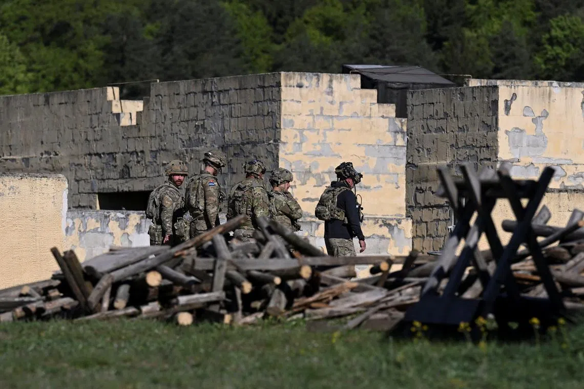 Soldiers operate during the U.S. Army Combined Resolve exercise at the U.S. Army's southern Germany training facilities in Hohenfels, Germany, April 30, 2026. REUTERS/Angelika Warmuth