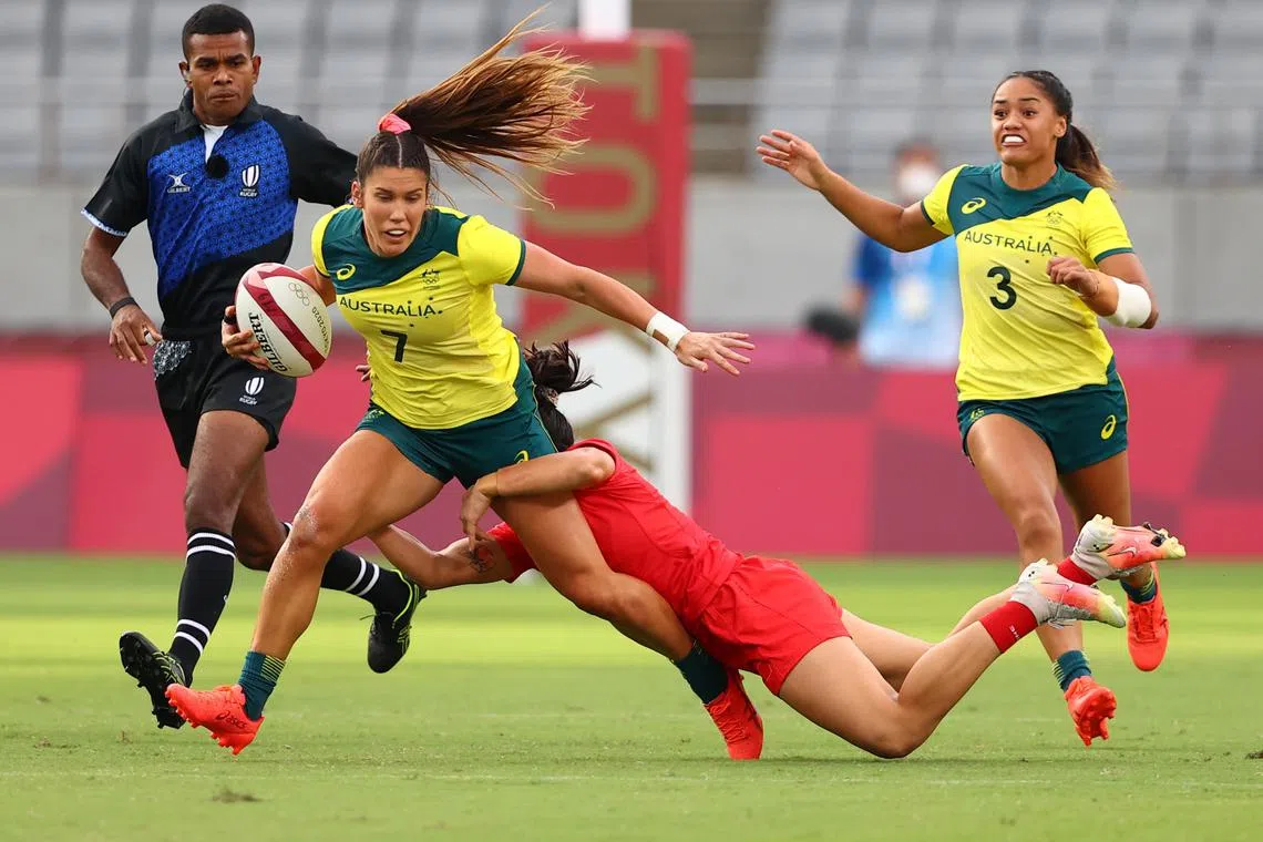 FILE PHOTO: Tokyo 2020 Olympics - Rugby Sevens - Women - Pool C - Australia v China - Tokyo Stadium - Tokyo, Japan - July 29, 2021. Charlotte Caslick of Australia in action./File Photo