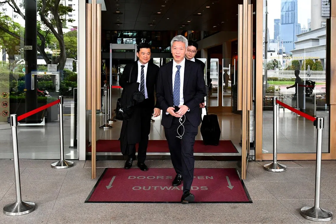 Mr Lee Hsien Yang (centre) leaving the Supreme Court on Apr 10, 2017.