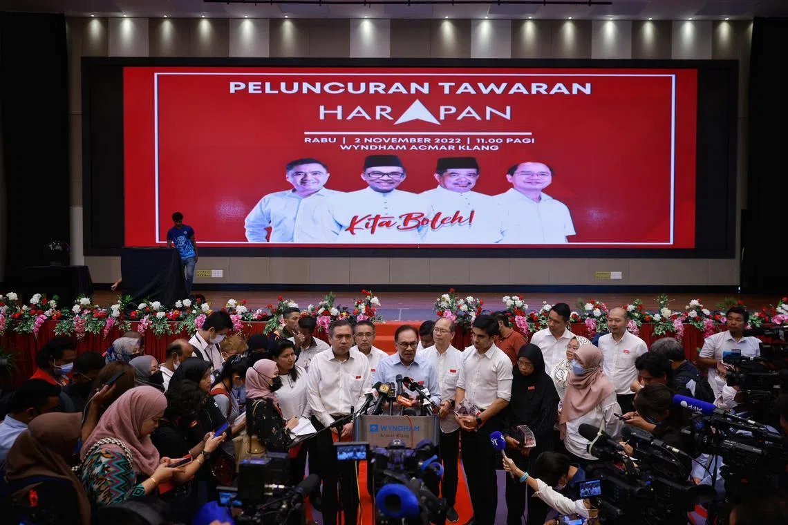 Anwar Ibrahim and Pakatan Harapan leaders take questions from the media at the Pakatan Harapan manifesto event at Wyndham Acmar Klang on November 2, 2022.