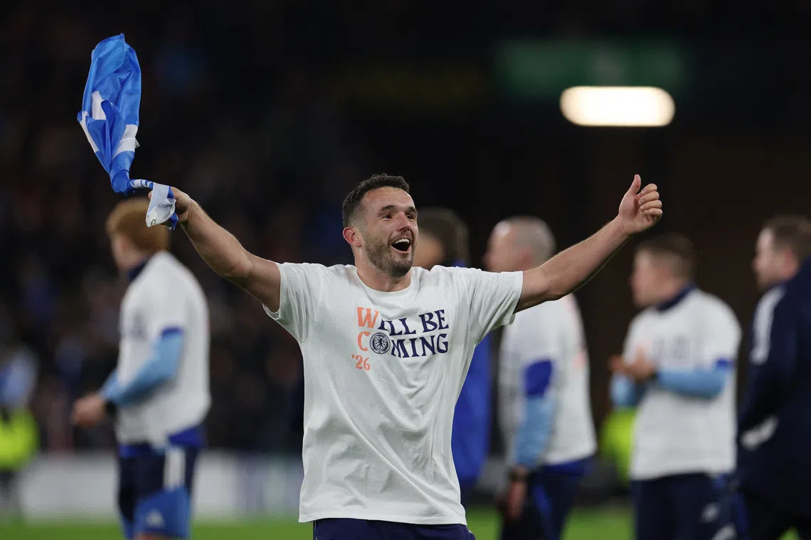 Soccer Football - FIFA World Cup - UEFA Qualifiers - Group C - Scotland v Denmark - Hampden Park, Glasgow, Scotland, Britain - November 18, 2025 Scotland's John McGinn celebrates after they qualify for the World Cup REUTERS/Russell Cheyne