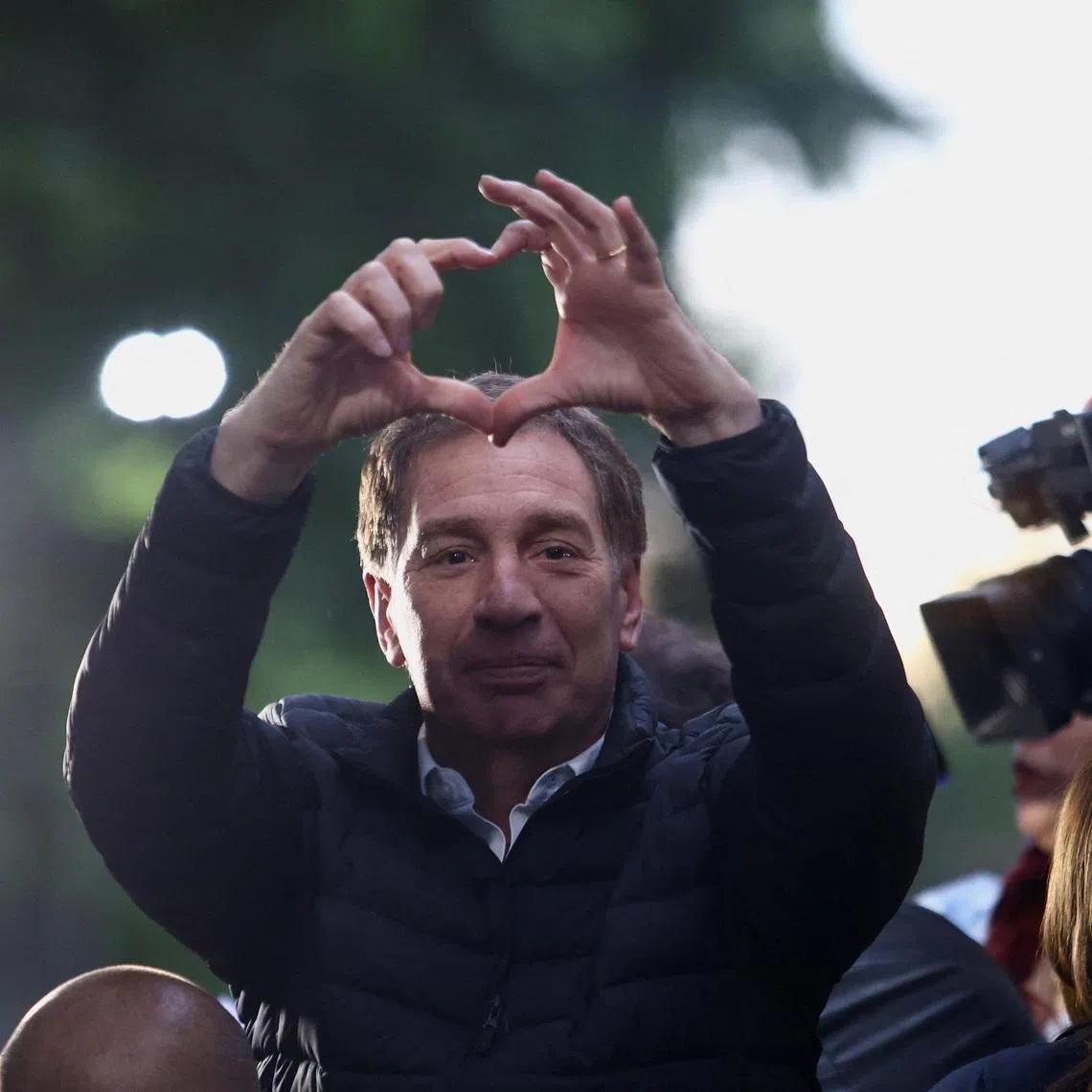 FILE PHOTO: Lawmaker Diego Santilli gestures during a La Libertad Avanza party rally in Tres de Febrero, on the outskirts of Buenos Aires, Argentina, October 17, 2025. REUTERS/Matias Baglietto/File Photo