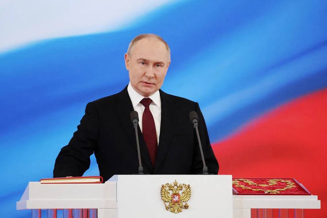 FILE PHOTO: Russian President Vladimir Putin takes the oath of office during his inauguration ceremony at the Kremlin in Moscow, Russia May 7, 2024. Sputnik/Vyacheslav Prokofyev/Pool via REUTERS/File Photo