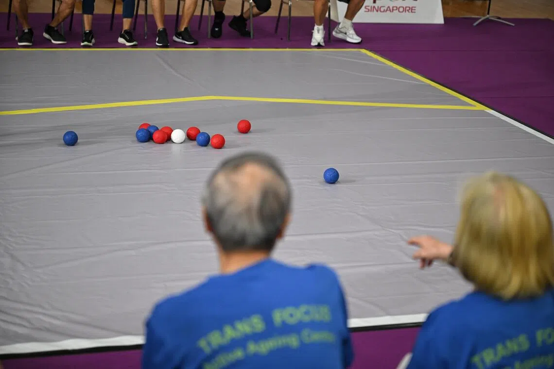 Spectators gesture during the boccia segment at the Seniors National Games Finals held at the OCBC Arena on August 4, 2026.