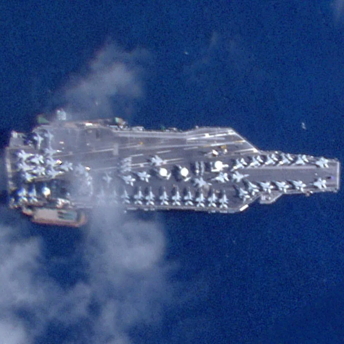The world's largest aircraft carrier, the USS Gerald Ford, with at least 40 fighter jets on its deck, off the coast of Saint Thomas, in the US Virgin Islands.