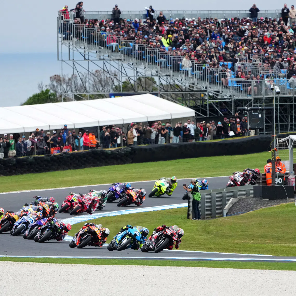 FILE PHOTO: MotoGP - Australian Grand Prix - Phillip Island Grand Prix Circuit, Phillip Island, Australia - October 19, 2025 General view of riders in action at the start of MotoGP race via REUTERS/Asanka Brendon Ratnayake/File Photo