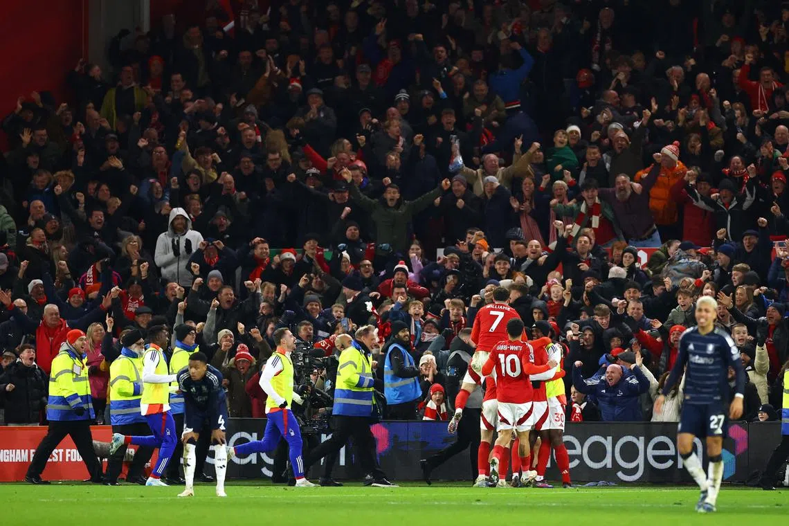 Nottingham Forest players celebrate after Anthony Elanga scored the second goal in the 2-1 Premier League win over Aston Villa.