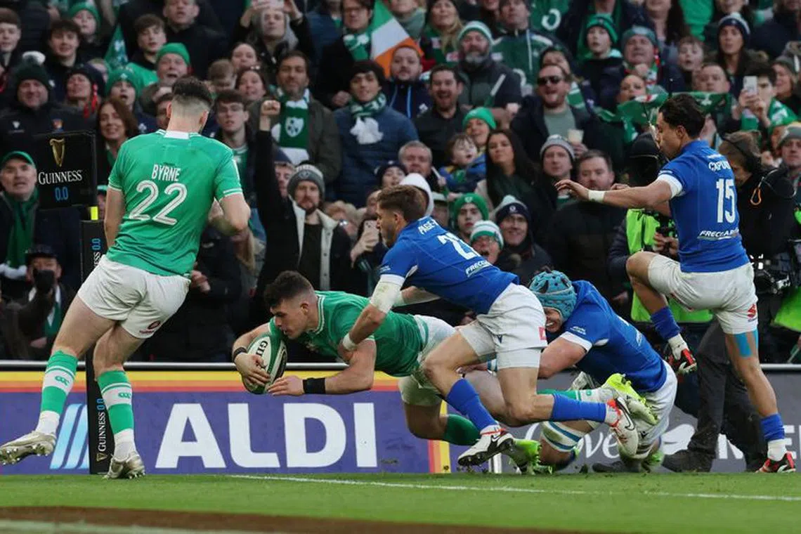 Rugby Union - Six Nations Championship - Ireland v Italy - Aviva Stadium, Dublin, Ireland - February 11, 2024 Ireland's Calvin Nash scores a try REUTERS/Lorraine O'sullivan