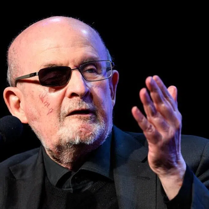Indian-British novelist Salman Rushdie speaks during the opening of the "Literature in the mist" festival in Heidenreichstein, near Zwettl in northern Austria on March 22, 2026. (Photo by MAX SLOVENCIK / APA / AFP) / Austria OUT