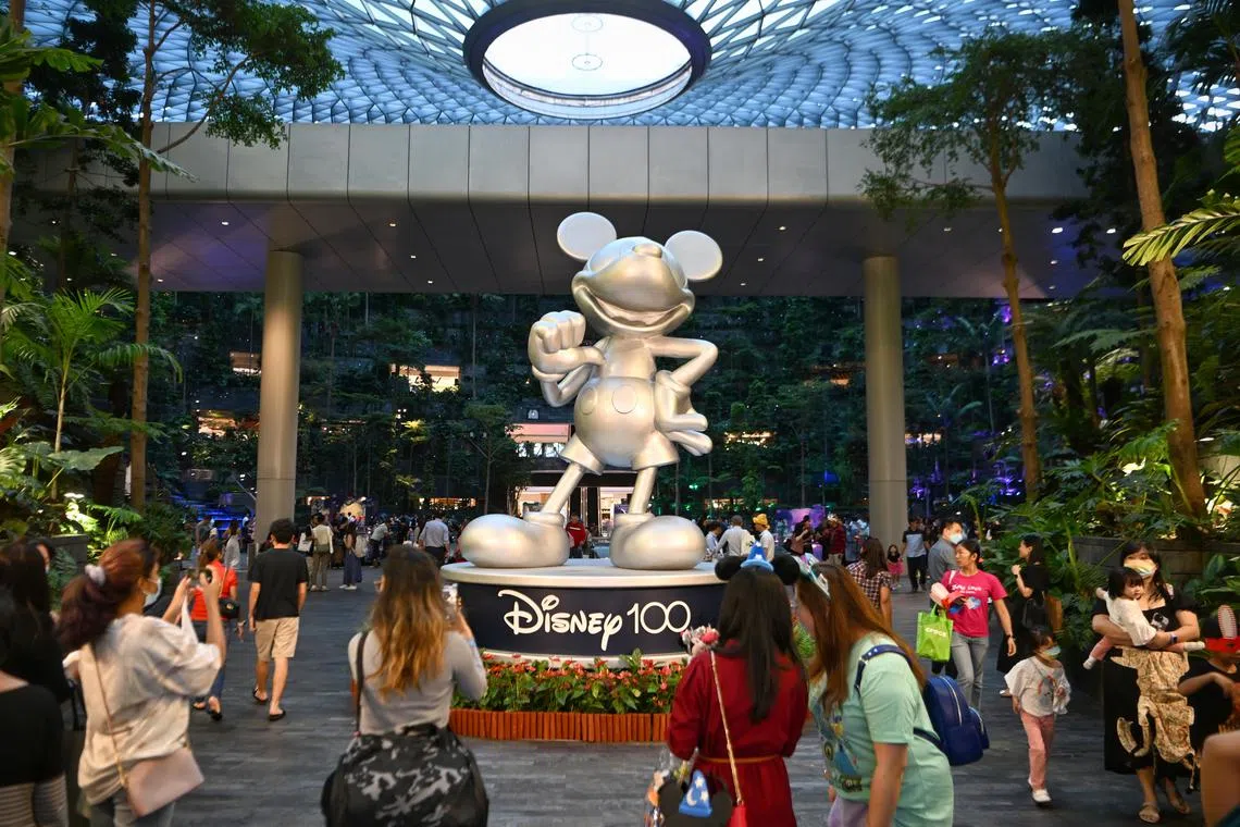 A platinum statue of Mickey Mouse in celebration of 100 years of Disney, at the Shiseido Forest Valley at Jewel Changi Airport, on Jan 12.