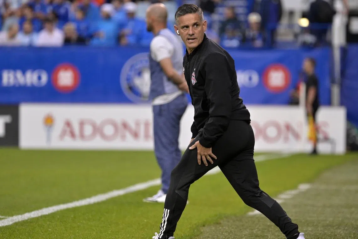 FILE PHOTO: Jul 20, 2024; Montreal, Quebec, CAN; Toronto FC head coach John Herdman during the first half of the game against the CF Montreal at Stade Saputo. Mandatory Credit: Eric Bolte-USA TODAY Sports/File Photo