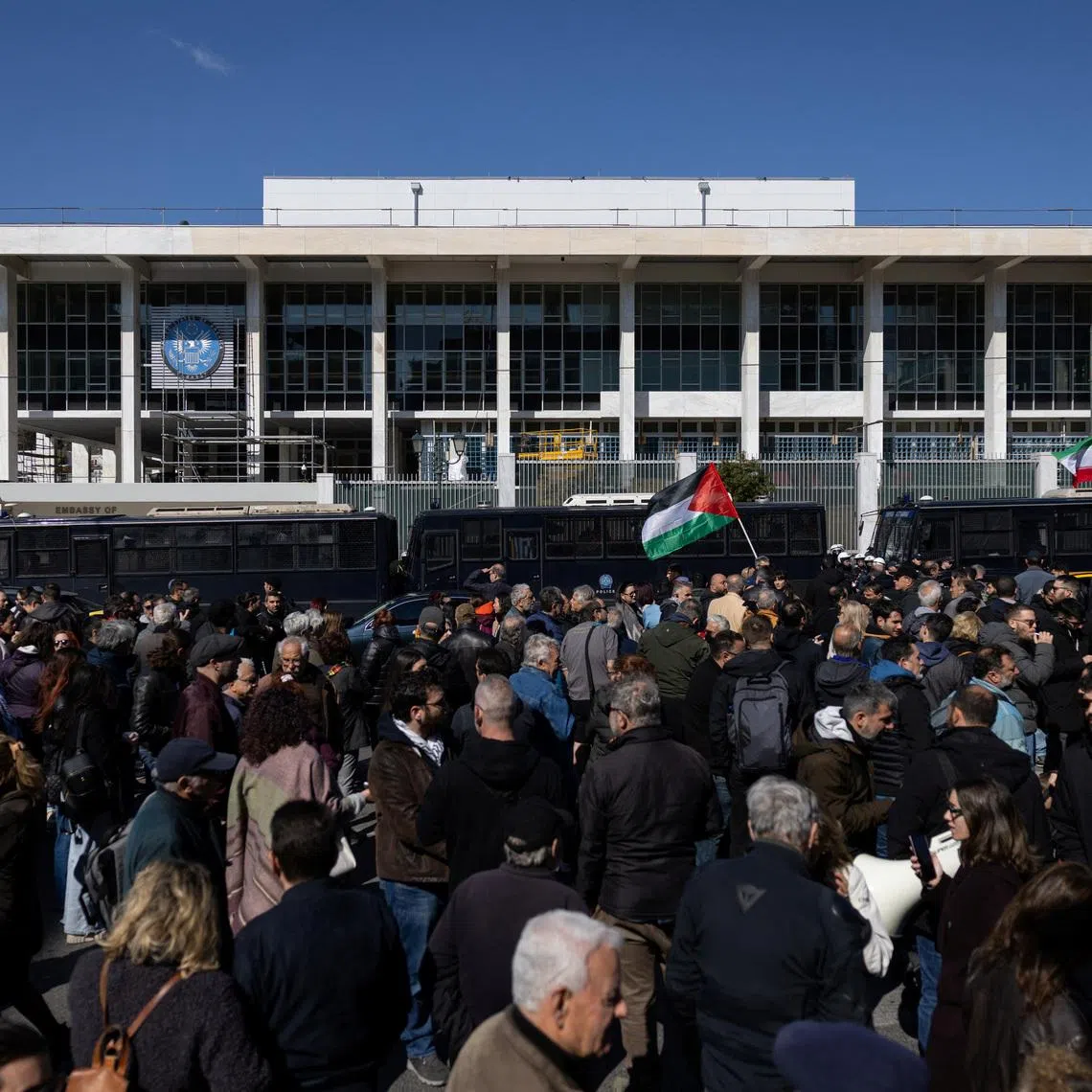 Protesters march outside the U.S. Embassy during an anti-war demonstration following strikes on Iran, in Athens, Greece, March 1, 2026. REUTERS/Stelios Misinas