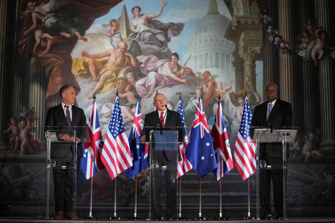 UK Defense Secretary John Healey, US Secretary of Defense Lloyd Austin, and Australian Defense Minister Richard Marles hold a press conference at the AUKUS Defence Ministers Meeting at Old Royal Naval College, Greenwich, London, Thursday, Sept. 26, 2024.  Kin Cheung/Pool via REUTERS