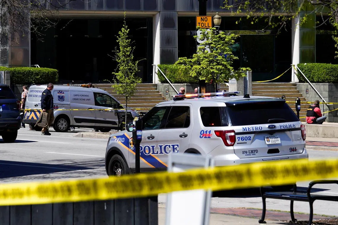 Police deploy at the scene of a mass shooting outside an Old National Bank branch in downtown Louisville, Kentucky