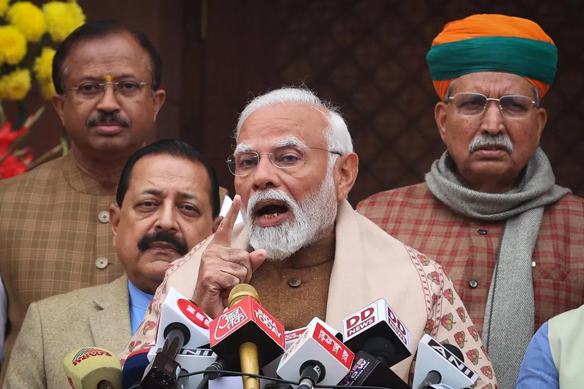 India's Prime Minister Narendra Modi speaks with the media inside the parliament premises upon his arrival on the first day of the budget session in New Delhi, India, January 31, 2024. REUTERS/Altaf Hussain/File Photo