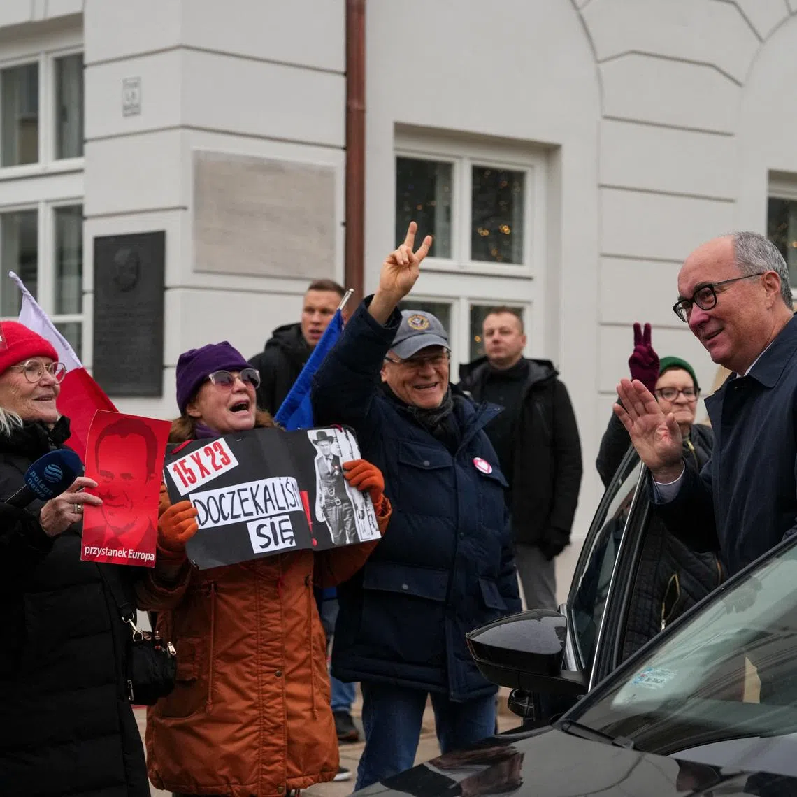 Co-leader of Poland's New Left (Nowa Lewica) party Wlodzimierz Czarzasty waves as people demonstrate in support of Poland's newly appointed cabinet during its swearing-in ceremony, in Warsaw, Poland December 13, 2023. REUTERS/Aleksandra Szmigiel