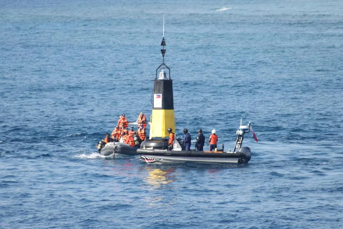 Vietnam rebuked the Philippines for placing navigational buoys in disputed waters around the Spratly archipelago.