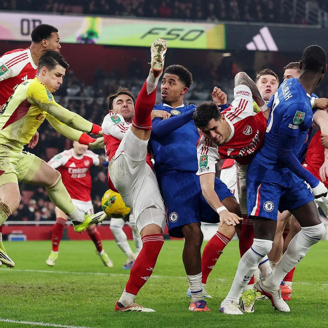 Soccer Football - Carabao Cup - Semi Final - Second Leg - Arsenal v Chelsea - Emirates Stadium, London, Britain - February 3, 2026 Chelsea's Trevoh Chalobah and Wesley Fofana in action with Arsenal's Piero Hincapie, Martin Zubimendi and Kepa Arrizabalaga Action Images via Reuters/Paul Childs