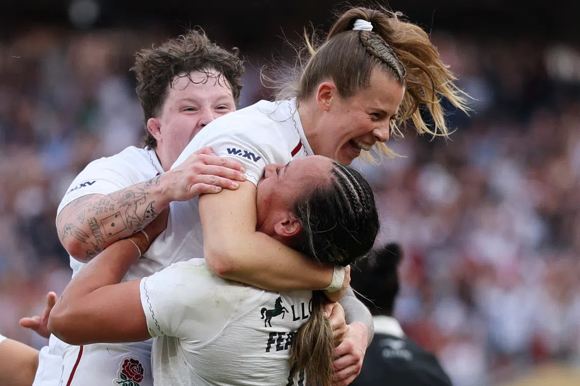 Rugby Union - Women's International Match - England v New Zealand - Allianz Stadium, Twickenham, Britain - September 26, 2026 England's Zoe Harrison celebrates scoring their fourth try with Maddie Feaunati Action Images via Reuters/John Sibley