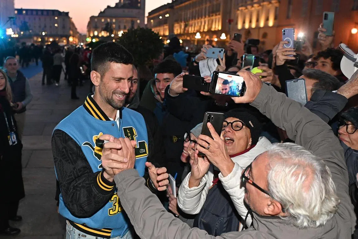 Novak Djokovic arrives at the presentation of the players for the ATP Finals at Piazzetta Reale in Turin, Italy.