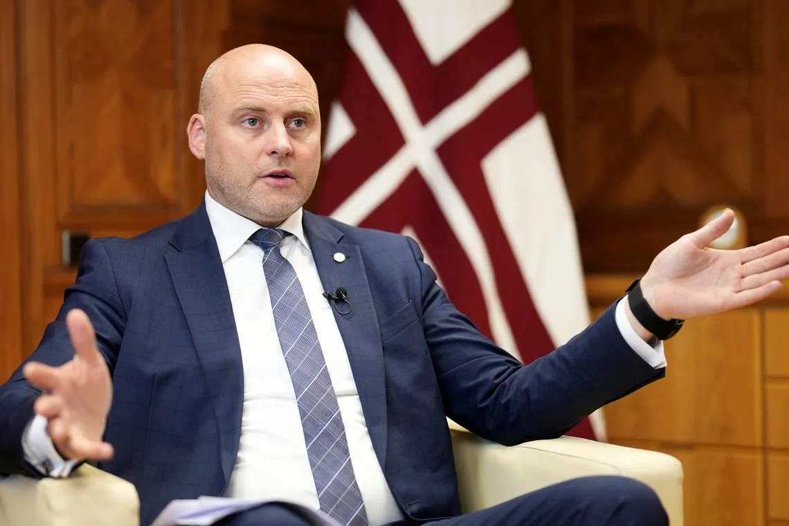 Latvian Prime Minister Andris Kulbergs gestures as he speaks to the media in Riga, Latvia, July 16, 2026. REUTERS/Ints Kalnins