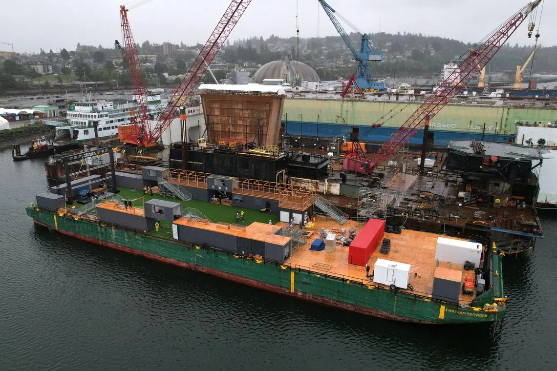 A drone view of a barge containing the Seattle Soccer Celebration floating pitch under construction at Everett Ship Repair in Everett, Washington, U.S., June 4, 2026. REUTERS/Matt Mills McKnight